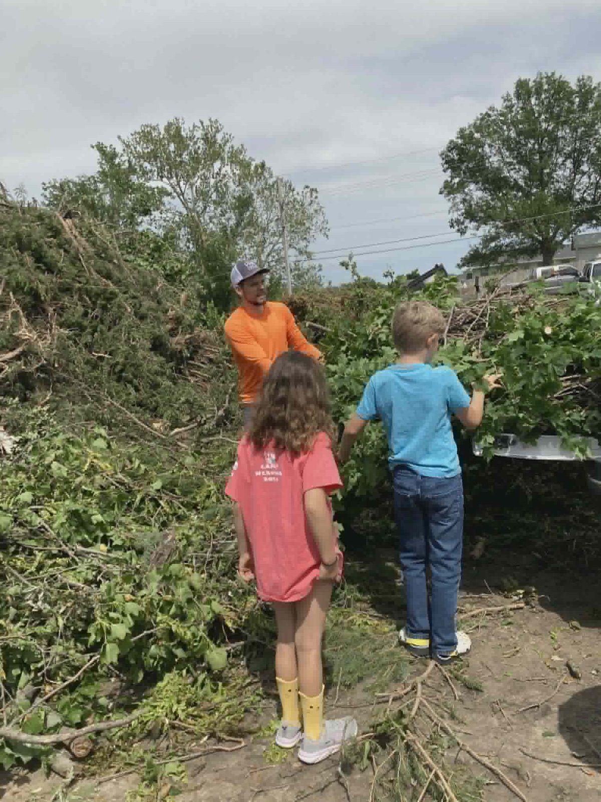 The limb removal team loading up for the dump