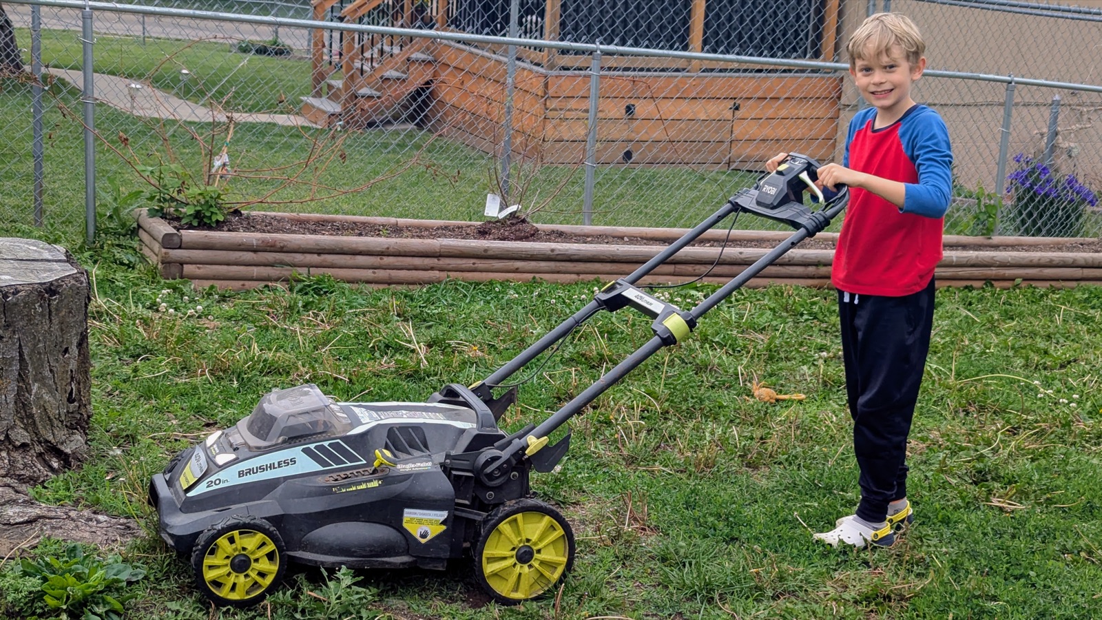 Malachi mowing the lawn on his first mission