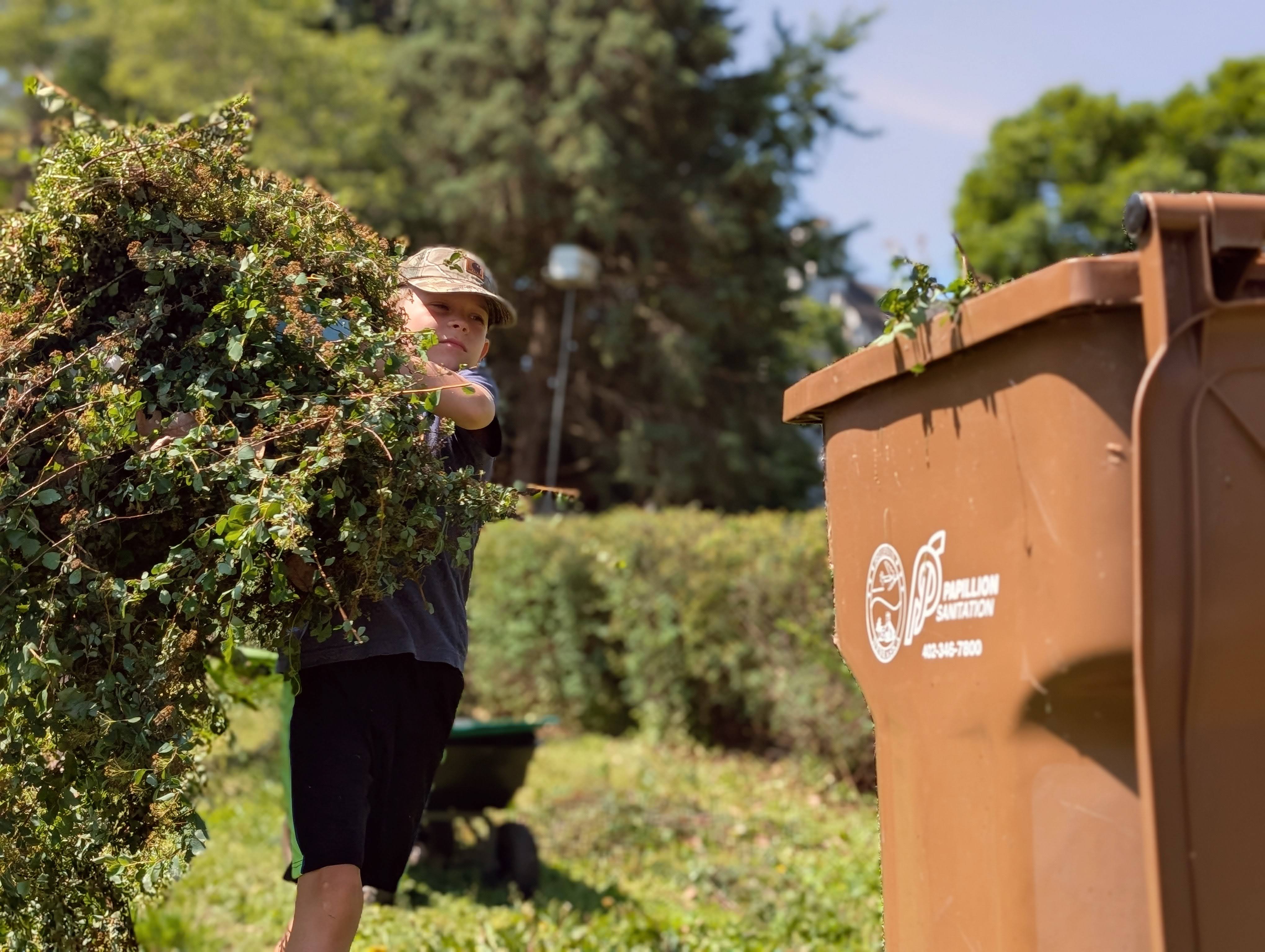Malachi doing yardwork